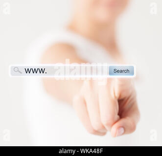female hand pressing Search button Stock Photo