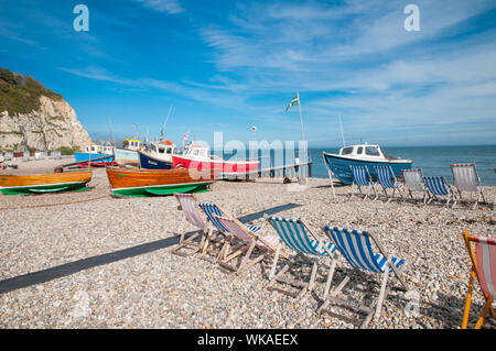 Fishing boats on the shore Beer Beach Devon England Stock Photo