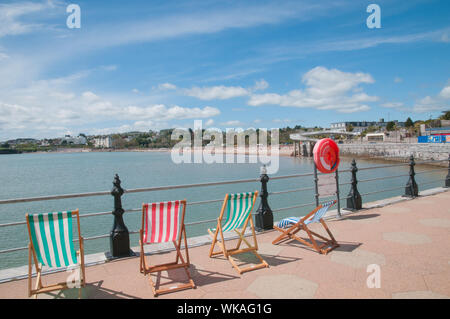 Deck Chairs on the Promenade Torquay Devon Stock Photo