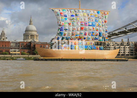 Westminster, London, 04th Sep 2019. Part of Totally Thames festival, the Ship of Tolerance is a beautiful 60-foot wooden boat installation on the River Thames at Tate Modern, with the artworks of children from around the world weaved together to create its sails. Promoting unity and encouraging tolerance, the ship becomes a beacon of acceptance and diversity. It was created by artists Ilya and Emilia Kabakov. Credit: Imageplotter/Alamy Live News Stock Photo