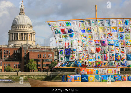 Westminster, London, 04th Sep 2019. Part of Totally Thames festival, the Ship of Tolerance is a beautiful 60-foot wooden boat installation on the River Thames at Tate Modern, with the artworks of children from around the world weaved together to create its sails. Promoting unity and encouraging tolerance, the ship becomes a beacon of acceptance and diversity. It was created by artists Ilya and Emilia Kabakov. Credit: Imageplotter/Alamy Live News Stock Photo