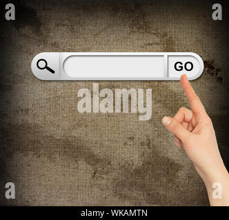 Human hand indicates the search bar in browser. Abstract background. Grunge style Stock Photo