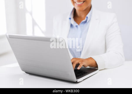 businesswoman using her laptop computer Stock Photo