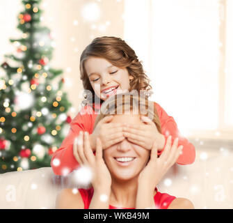 mother and daughter making a joke Stock Photo