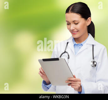 female doctor with stethoscope and tablet pc Stock Photo