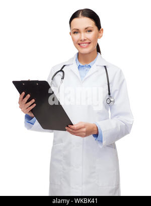 smiling female doctor with clipboard Stock Photo