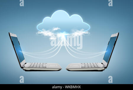 two laptop computers with world map hologram Stock Photo