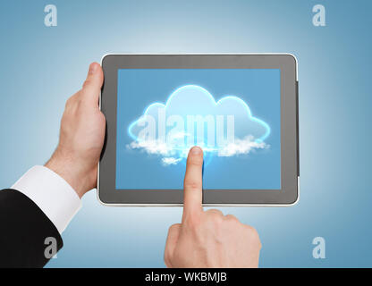close up of man hands touching tablet pc Stock Photo