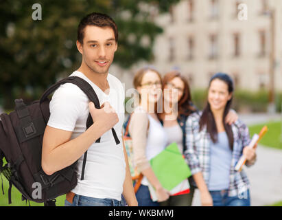 education, school and vacation concept - travelling student with backpack Stock Photo