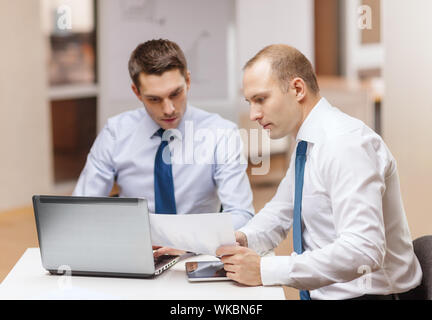 two businessmen having discussion in office Stock Photo