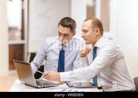 two businessmen having discussion in office Stock Photo