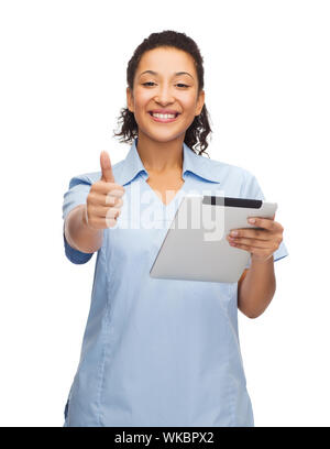 smiling black doctor or nurse with tablet pc Stock Photo
