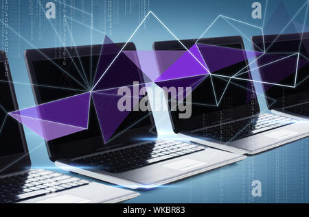 technology and advertisement concept - many laptop computers with blank black screens Stock Photo
