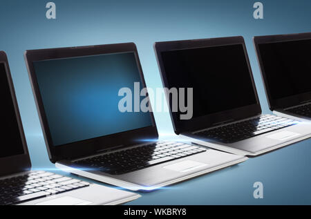 many laptop computers with blank black screens Stock Photo