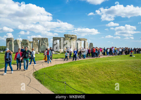 Crowds at Stonehenge stone circle stonehenge near Amesbury Wiltshire england uk gb Europe