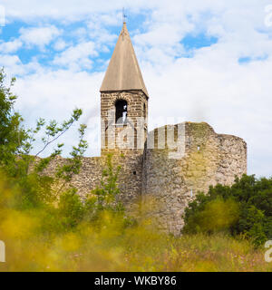 Church of the Holy Trinity, which contains famos late-medieval Danse Macabre fresco. Slovenia, Europe. Stock Photo