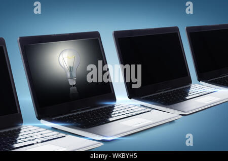 technology and advertisement concept - many laptop computers with blank black screens Stock Photo