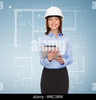 young smiling businesswoman in white helmet Stock Photo