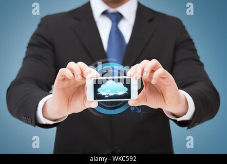 businessman showing smartphone with blank screen Stock Photo