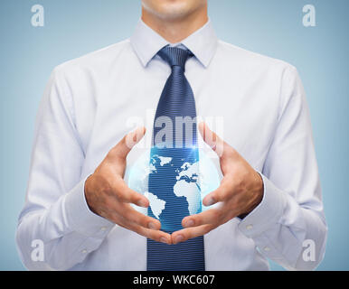 buisnessman holding something in his hands Stock Photo