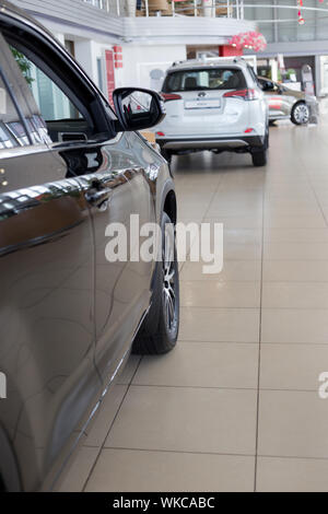 Russia, Izhevsk - July 18, 2019: New cars in the Toyota showroom. Famous world brand. Prestigious vehicles. Stock Photo