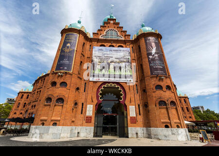 Facade of the famous Campo Pequeno bullring of Lisbon, Portugal, built in 1890 in neo-Mudejar style and entirely covered by orange bricks Stock Photo