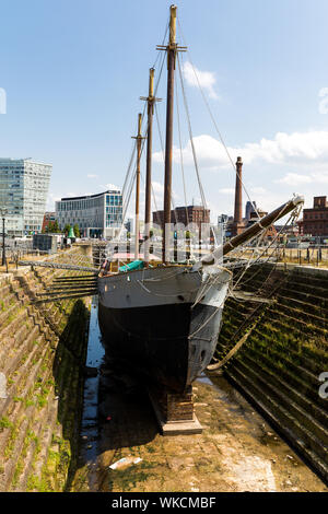 De Wadden Three mast auxilliary schooner and dazzle ship Edmund Gardner in dry dock, Albert Docks,Liverpool,England,UK Stock Photo