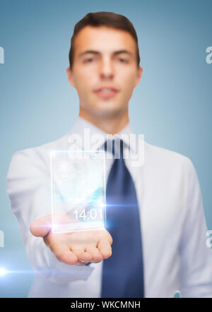 buisnessman showing transparent phone Stock Photo