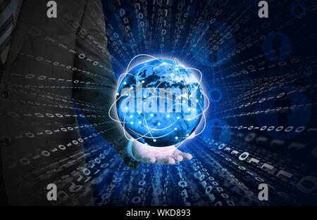 Businessman holding glowing figures and Earth. Elements of this image are furnished by NASA Stock Photo