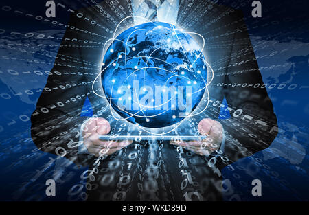 Businessman holding tablet in his hands. Glowing figures and Earth. Elements of this image are furnished by NASA Stock Photo