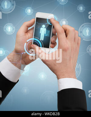 businessman touching screen of smartphone Stock Photo