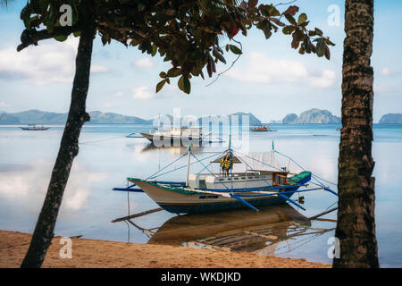 Small bangka boats on Corong Corong beach, El Nido, Philippines Stock Photo