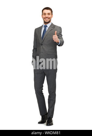 business, gesture and office concept - handsome buisnessman showing thumbs up Stock Photo