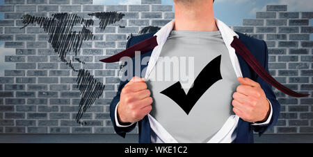 Businessman opening shirt in superhero style against world map doodle against wall Stock Photo