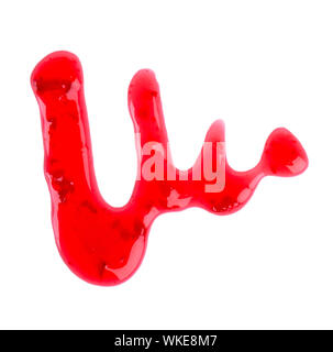 Cherry jam drizzle isolated on white background. Splashes of red berry jam. Top view. Stock Photo