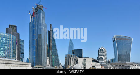 City of London cityscape skyline at 22 Bishopsgate landmark skyscraper construction site & completed modern skyscraper office building landmarks UK Stock Photo