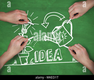 Composite image of multiple hands writing idea with chalk against green Stock Photo