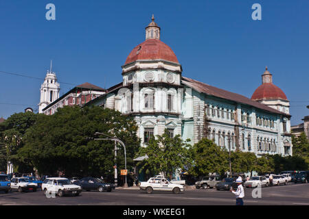 The colonial architecture of the historical center in Yangon on the intersection of Pansodan Street and Strand Road Stock Photo