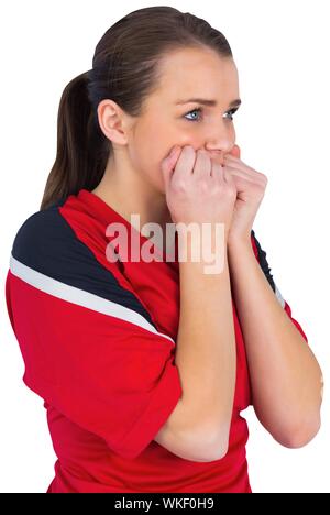 Nervous football fan in red on white Stock Photo