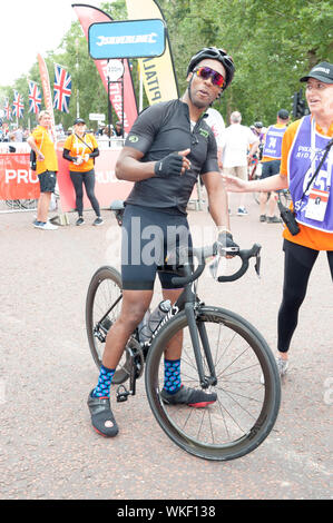 Celebrity cyclists cross the finish line on the Mall after completing Ride London - Surrey, in London, United Kingdom Featuring: Lemar Where: London, United Kingdom When: 04 Aug 2019 Credit: WENN.com Stock Photo