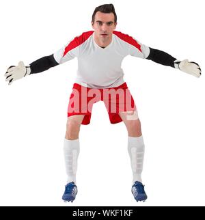 Goalkeeper in white ready to save on white background Stock Photo