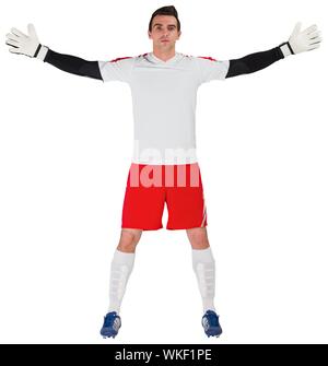 Goalkeeper in white ready to save on white background Stock Photo