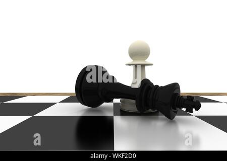 White pawn standing over fallen black king on white background Stock Photo