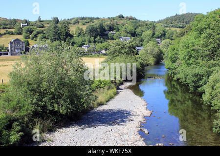 Afon Lledr flowing through the village of Dolwyddelan, Conwy, Wales Stock Photo