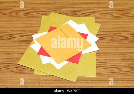 envelope on wood background Stock Photo