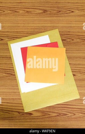 envelope on wood background Stock Photo
