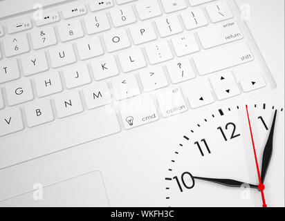 Clock face on the keyboard. View from above Stock Photo
