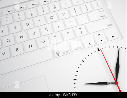 Clock face on the keyboard. View from above Stock Photo
