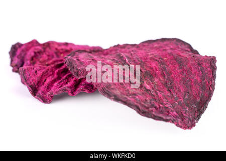 Group of two slices of dried red beetroot isolated on white background Stock Photo