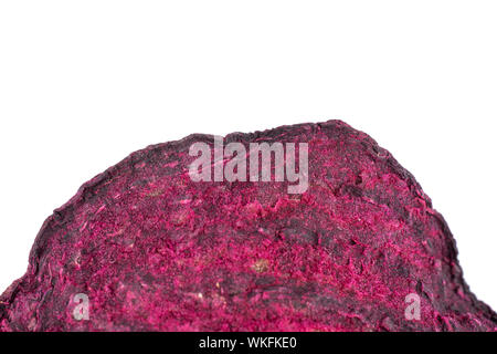One slice of dried red beetroot in closeup isolated on white background Stock Photo